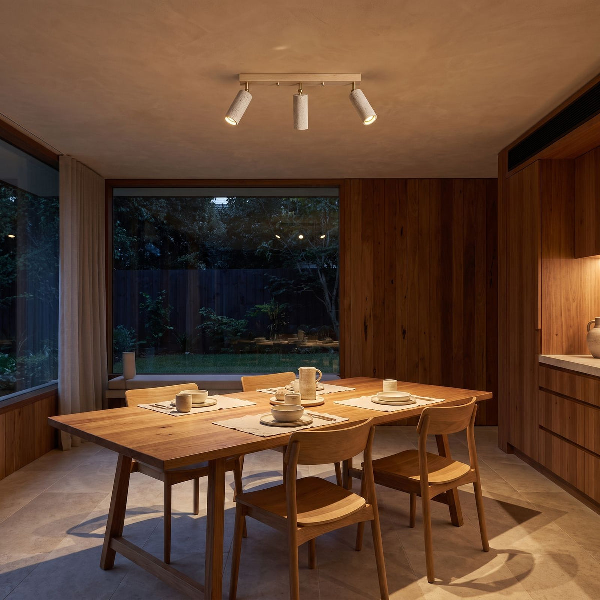 3-Head Travertine-Look Spotlight Ceiling Light above a dining area