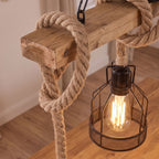 Close-up of the hemp rope on the wood beam and an iron cage