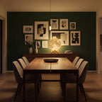 The 3D moon lamp in 20 cm as a centrepiece on a sideboard in a dining room at night
