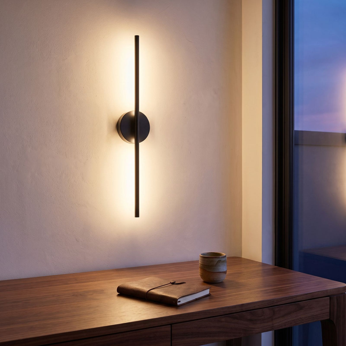 Bar and disc LED wall sconce above a home office desk