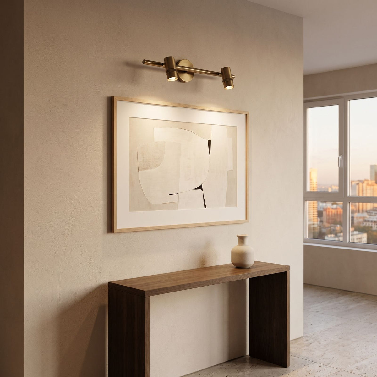 Adjustable Brass Spotlight Dimmable LED Wall Light with 2 heads above framed art in an entry hall