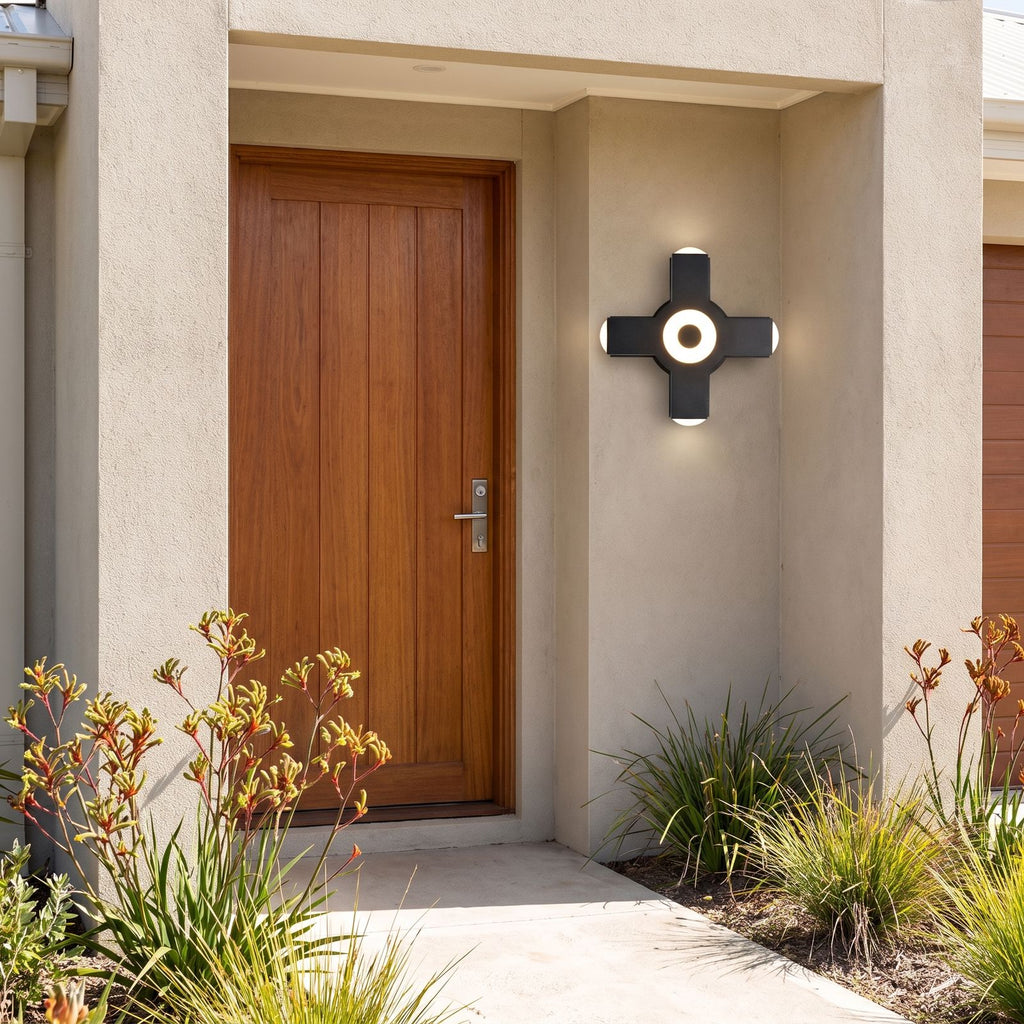 Adjustable Multi Head Outdoor Wall Light beside a timber front door