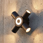 Adjustable Multi Head Outdoor Wall Light, close view at 45 degrees on a stone wall
