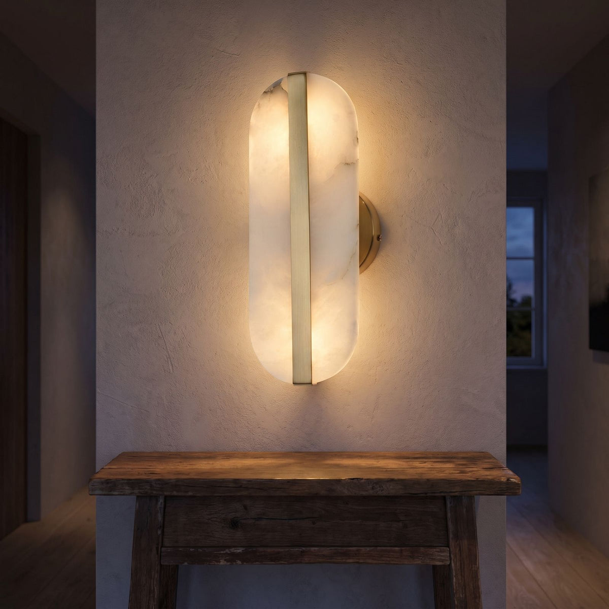 Alabaster and Brass Wall Sconce in a hallway above a timber console