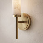 Alabaster Candle Brass Wall Sconce, close view at 45 degrees on a plaster wall