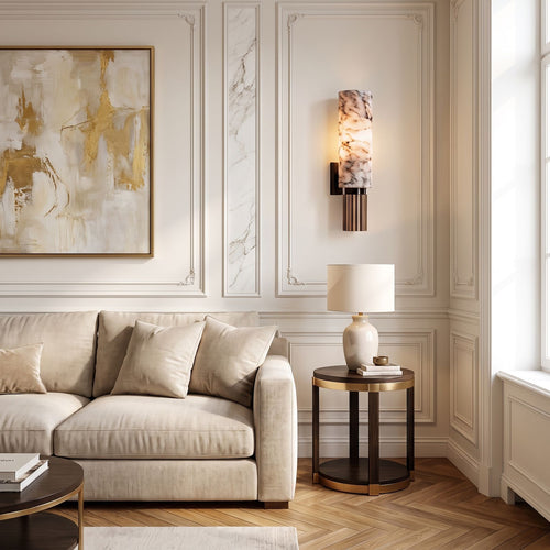Alabaster Cylinder and Fluted Copper Wall Light beside a sofa in a living room
