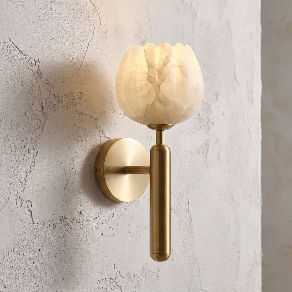 Marble Flower Petal Brass Wall Sconce, close view at 45 degrees on a plaster wall