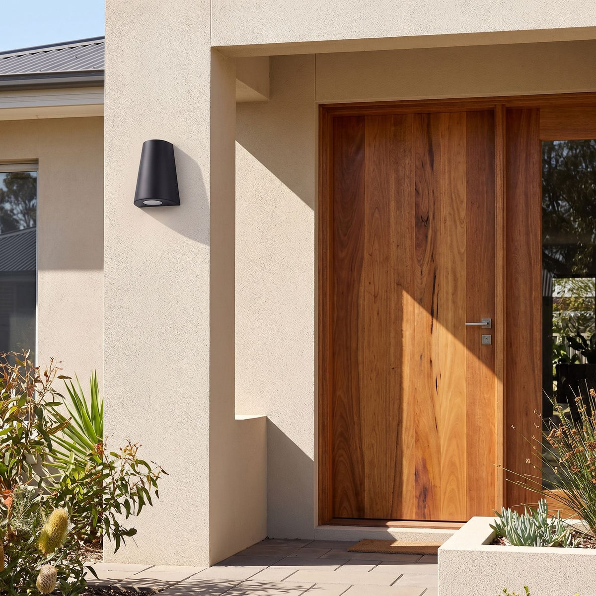 Aluminium COB LED Outdoor Wall Light beside a timber front door