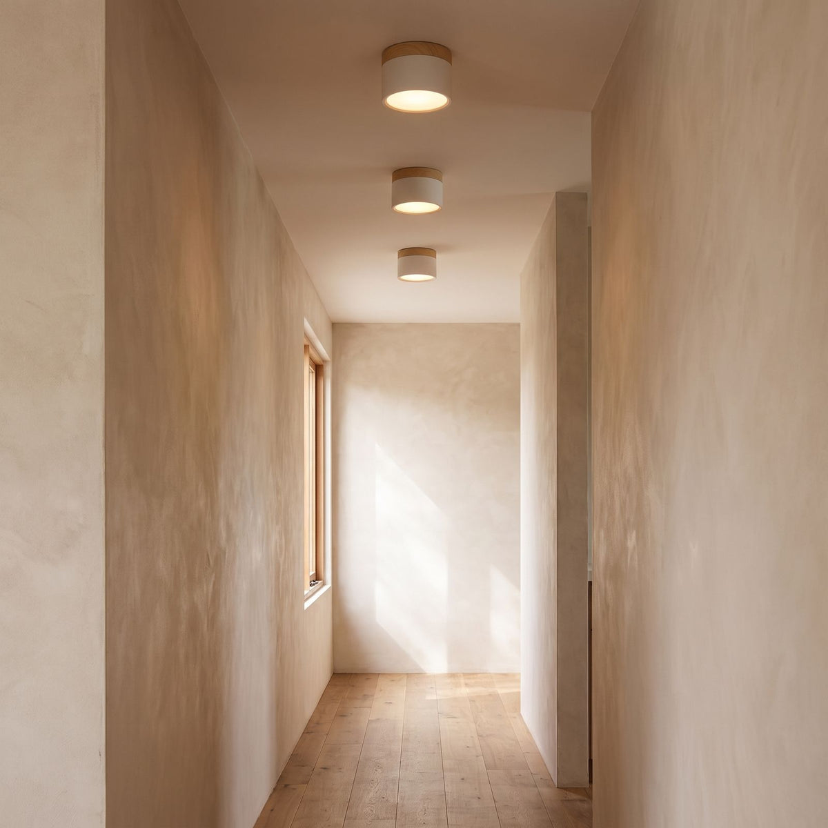Aluminium Cylinder LED Spotlight Ceiling Light along a hallway ceiling