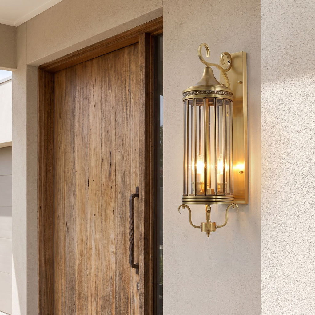 Arabian Style Brass and Glass Outdoor Wall Lantern beside a timber front door
