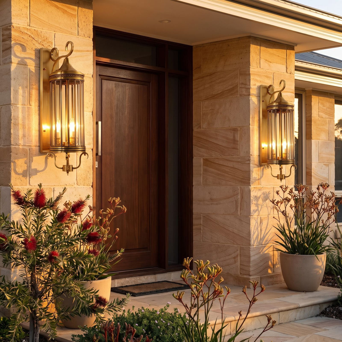 Arabian Style Brass and Glass Outdoor Wall Lantern in a pair on the facade of an Australian home