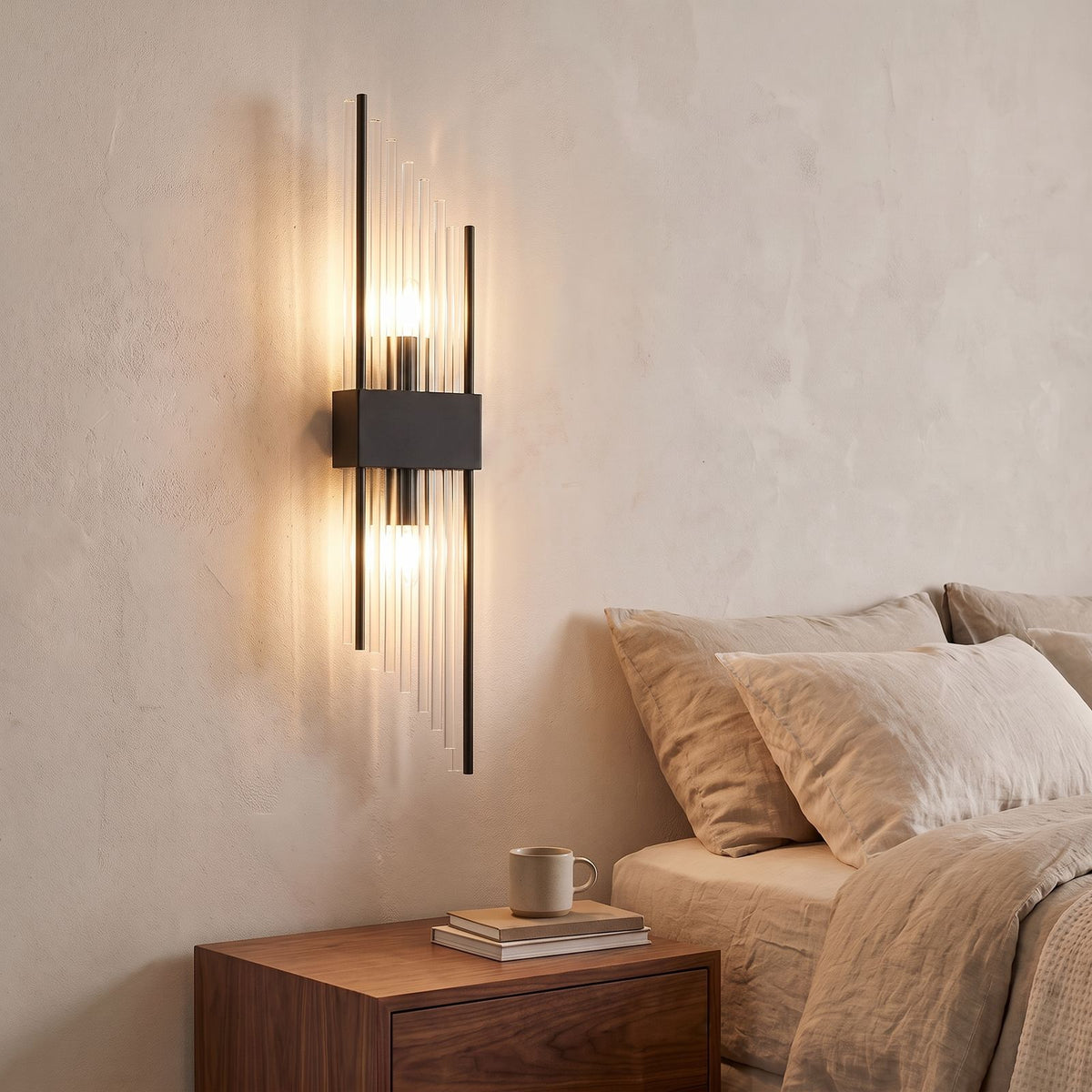 Art Deco Crystal Glass Rod Wall Light in black beside a bed