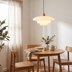Art Deco Tiered Glass and Brass Pendant Light in a breakfast nook
