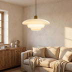 Art Deco Tiered Glass and Brass Pendant Light in a living room