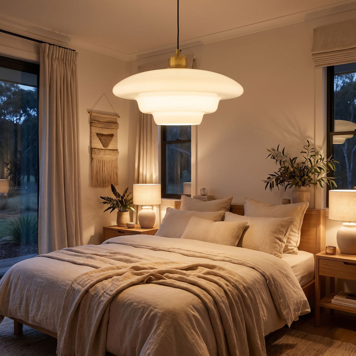 Art Deco Tiered Glass and Brass Pendant Light above a bed