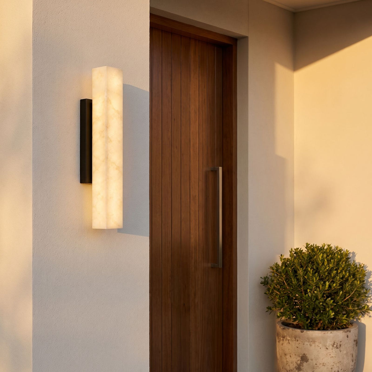 Artificial Alabaster Rectangular Outdoor Wall Light beside a timber front door on a rendered wall