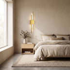 Asymmetric Linear LED Wall Sconce on a bedroom wall beside the bed