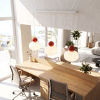 Ball-top scalloped acrylic 3-light pendant above a home office desk in daylight
