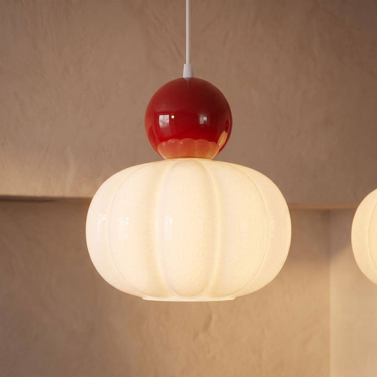 Close-up of one ribbed shade and ball top