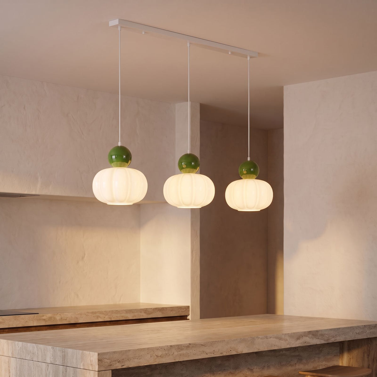 Ball-Top Scalloped Acrylic 3-Light Pendant Light with green balls over a kitchen island