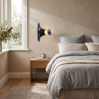 Bauhaus Retro Iron Wall Light on a bedroom wall beside the bed