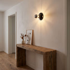 Bauhaus Retro Iron Wall Light in a hallway above a timber console