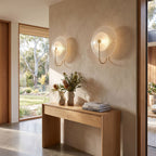 Bent Rod Round Glass Wall Light in a pair on a wall of an Australian home