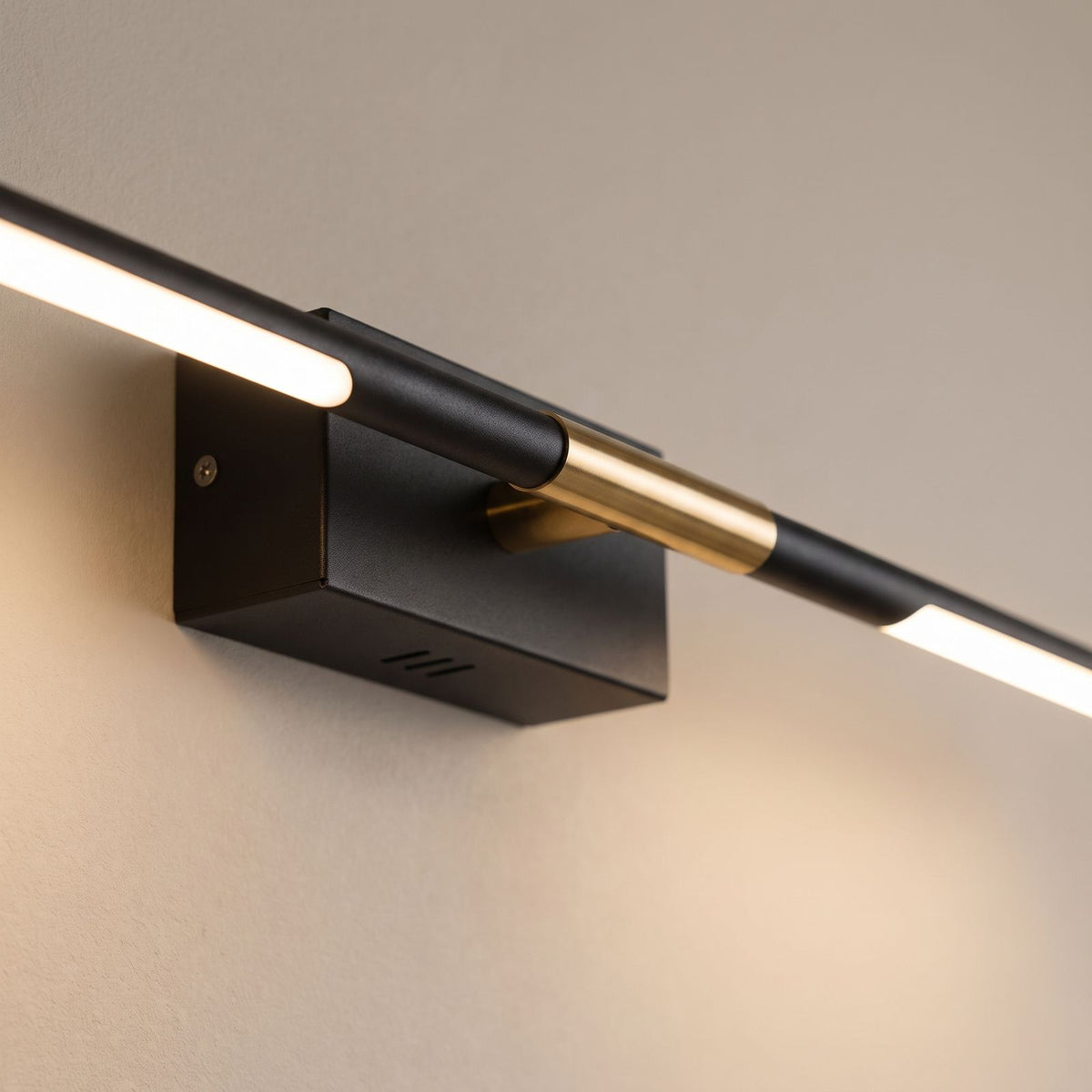 Black and Gold Acrylic Tube LED Vanity Wall Light: close-up of the materials and finish