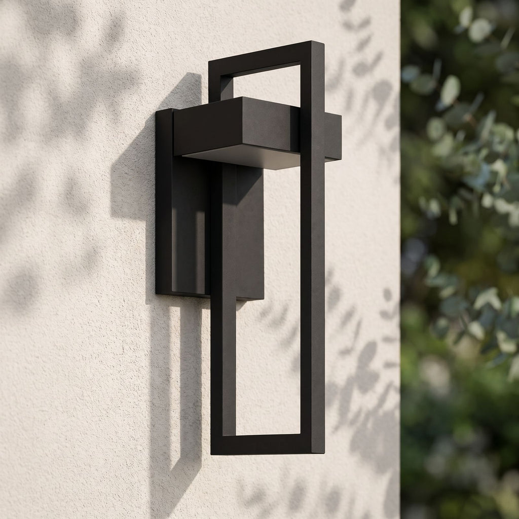 Black Frame Outdoor Wall Sconce on a rendered wall, angled close view