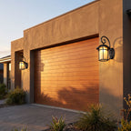 Black Iron and Amber Glass Outdoor Wall Light in a pair either side of an entry door