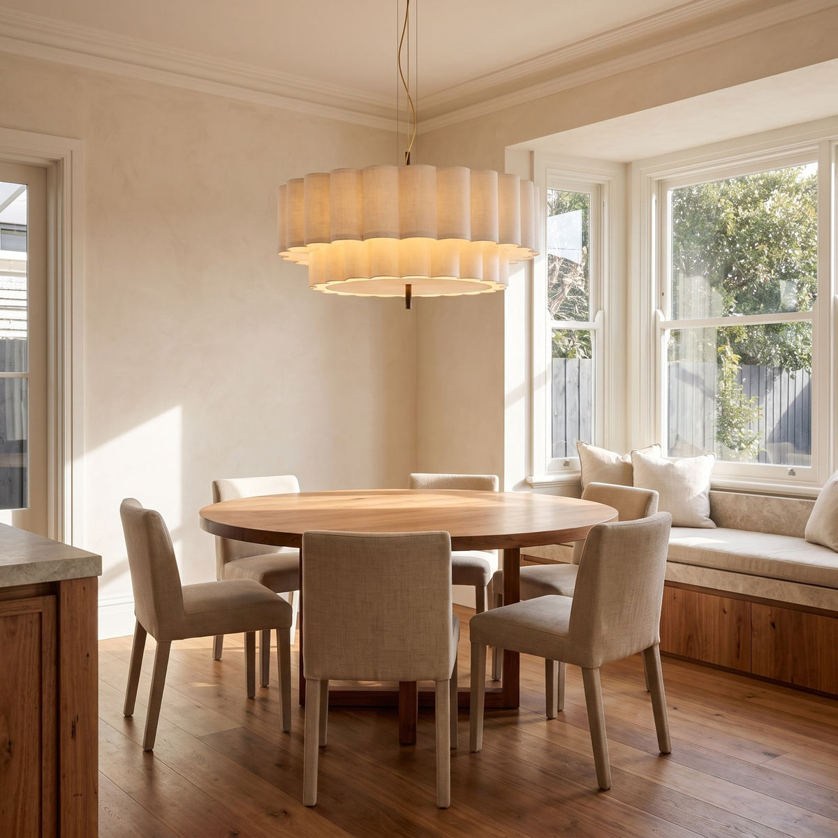 Boho Knitted Fabric Ripple Pendant Light above a round table in a breakfast nook