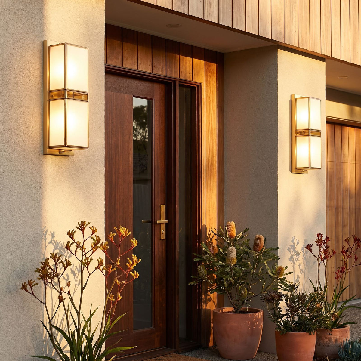 Brass and White Glass Outdoor Wall Light in a pair either side of an entry door