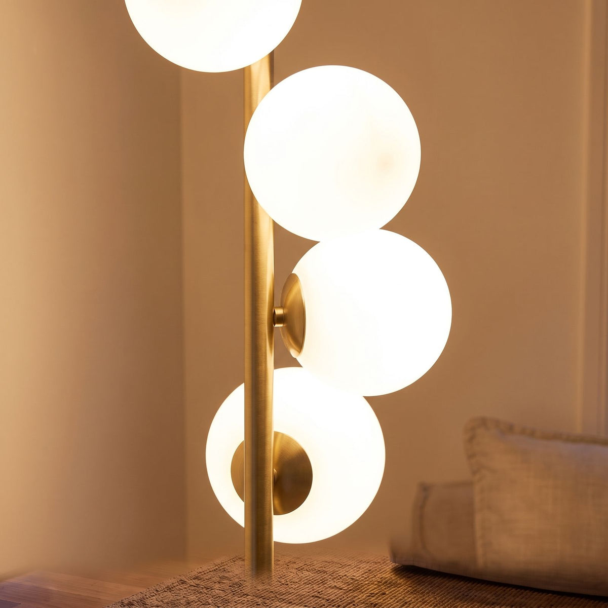 Close-up of the opal glass globes on the brass finish pole