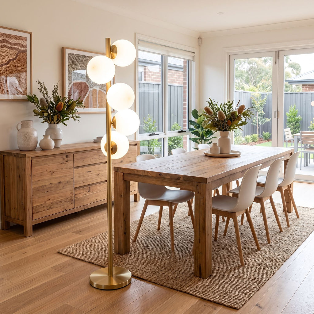 Brass Finish 6-Light Opal Glass Globe Floor Lamp above a dining table