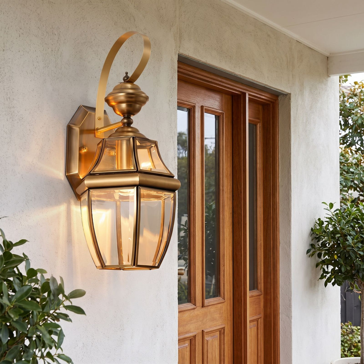 Brass Lantern Outdoor Wall Light beside a timber front door