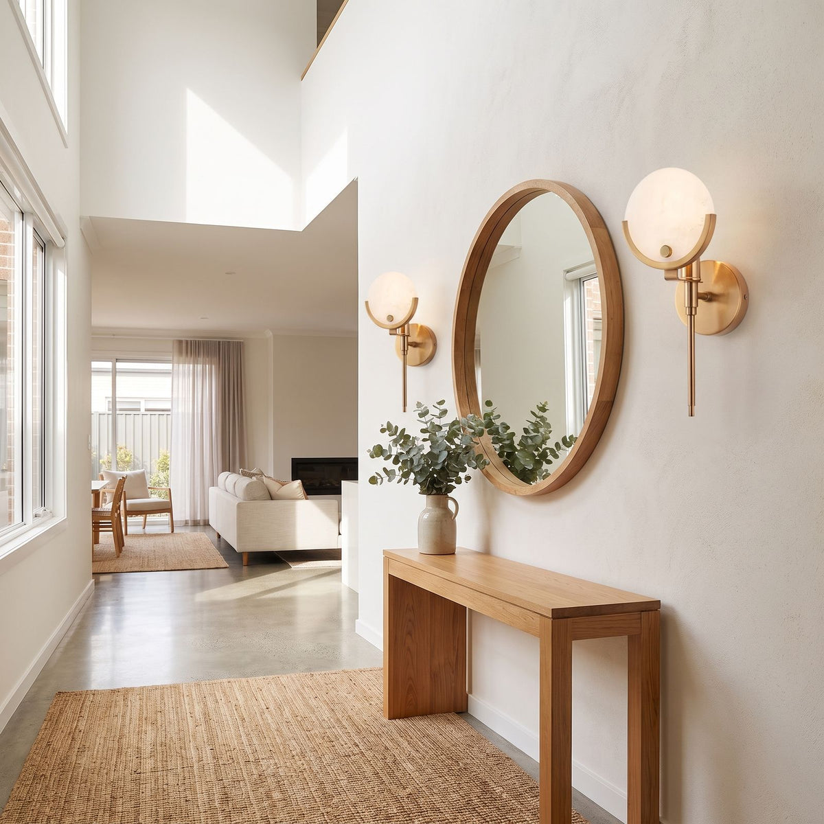 Brass Rod Alabaster Globe Wall Light in a pair on a wall of an Australian home