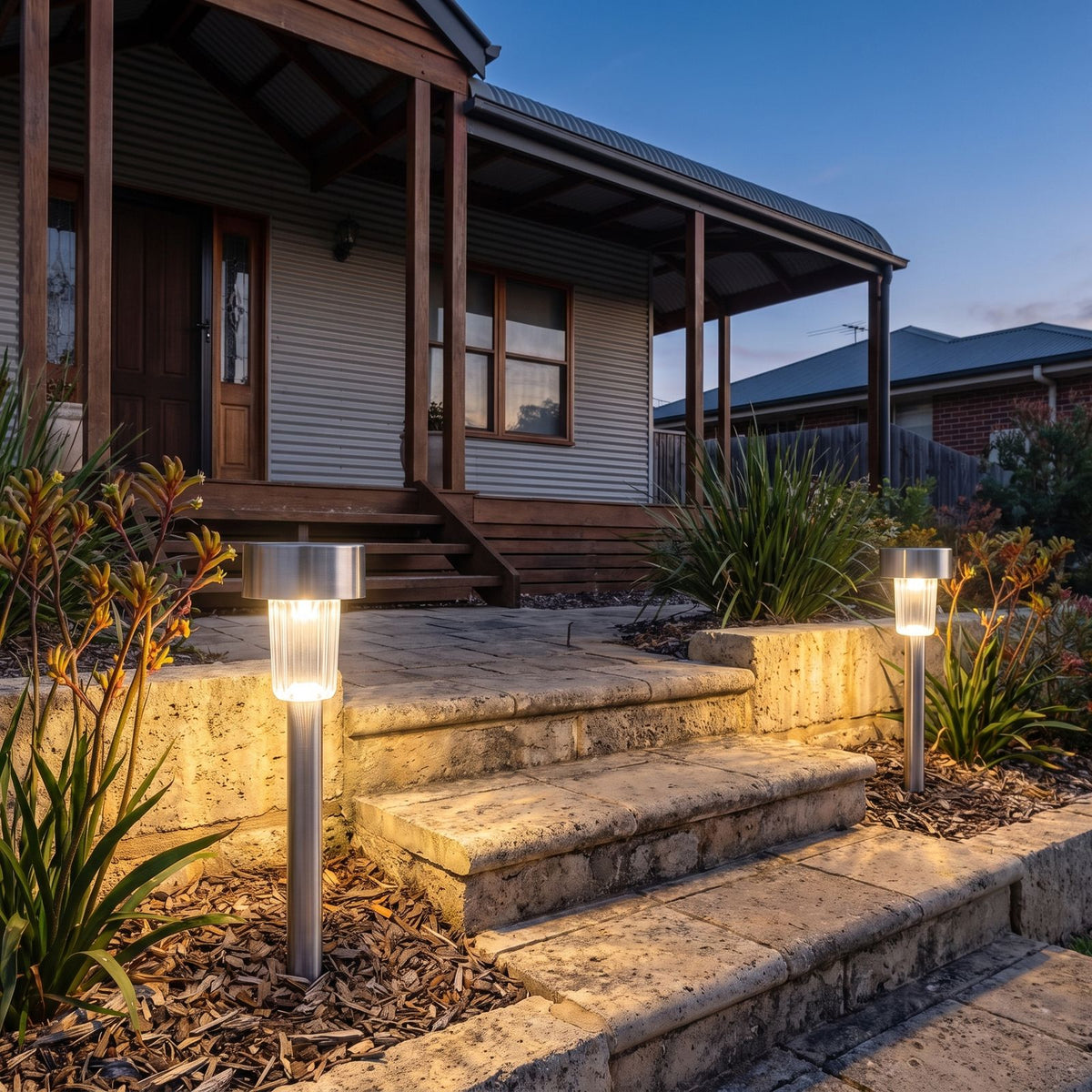 Stainless steel solar garden path light either side of front steps