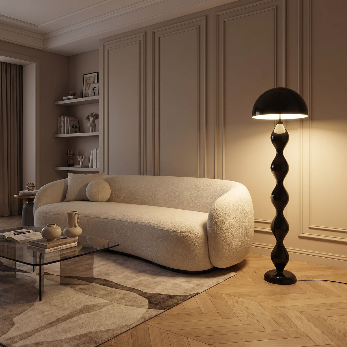 Bubble Stem Metal Mushroom Floor Lamp in black beside a sofa in a panelled living room in the evening