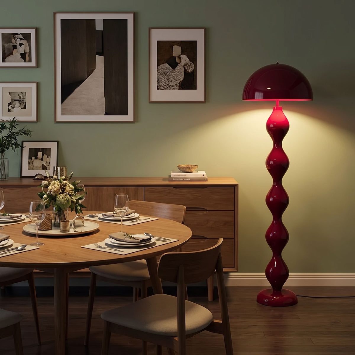 Red mushroom floor lamp beside a sideboard in a dining room at night