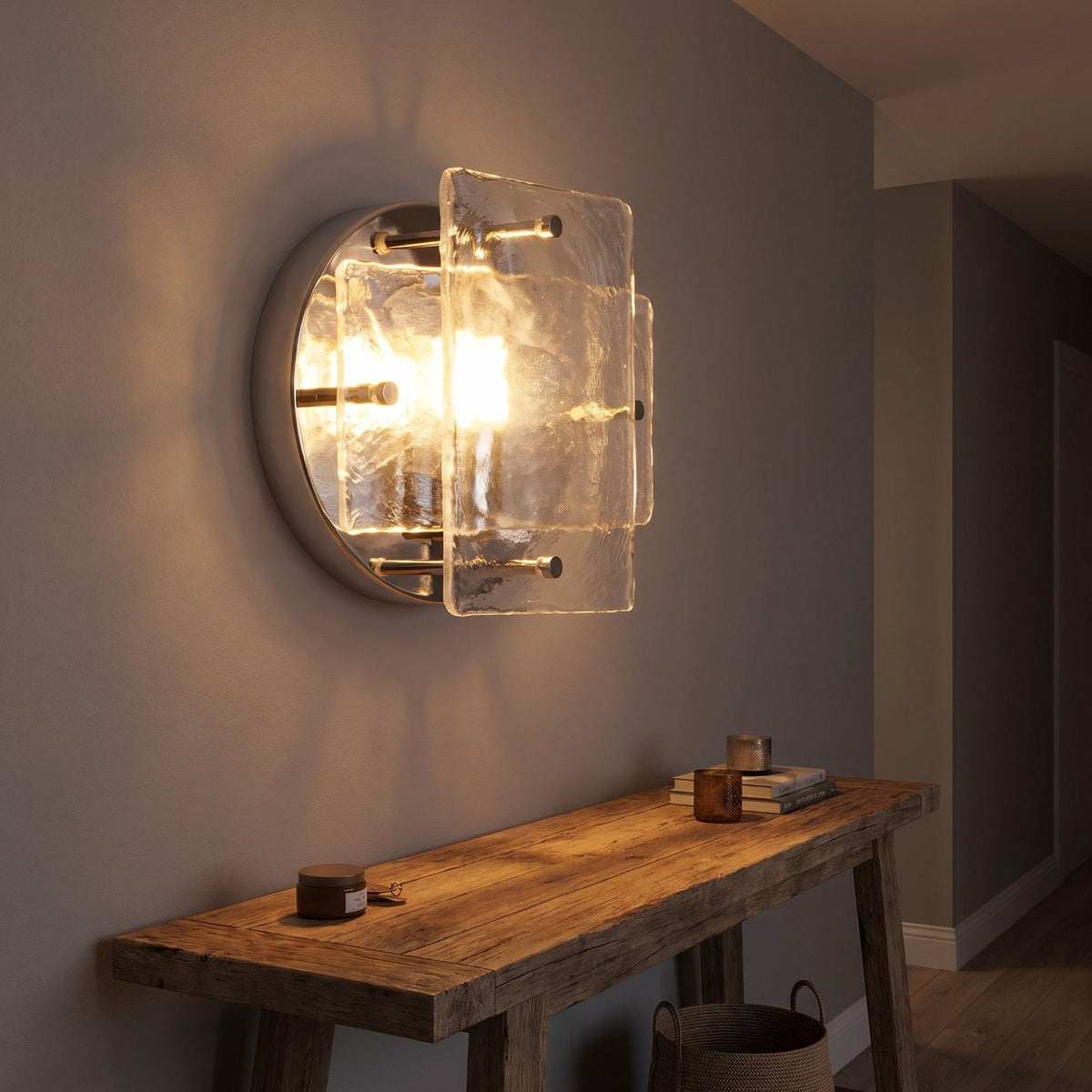 Chrome Frame Round Glass Wall Light in a hallway above a timber console