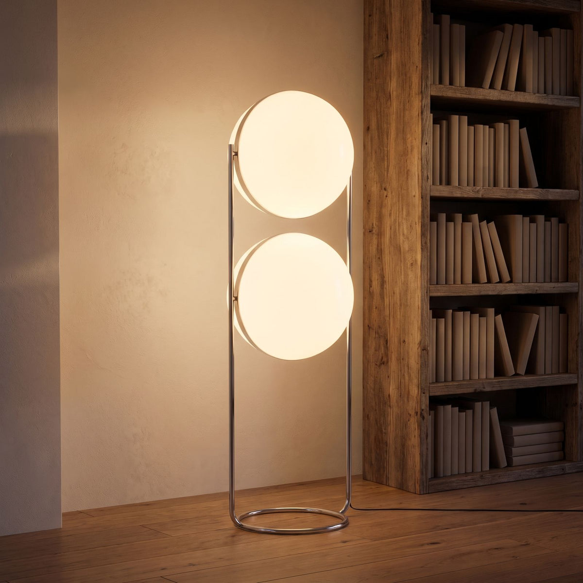 Chrome ring double globe floor lamp in a reading corner at night