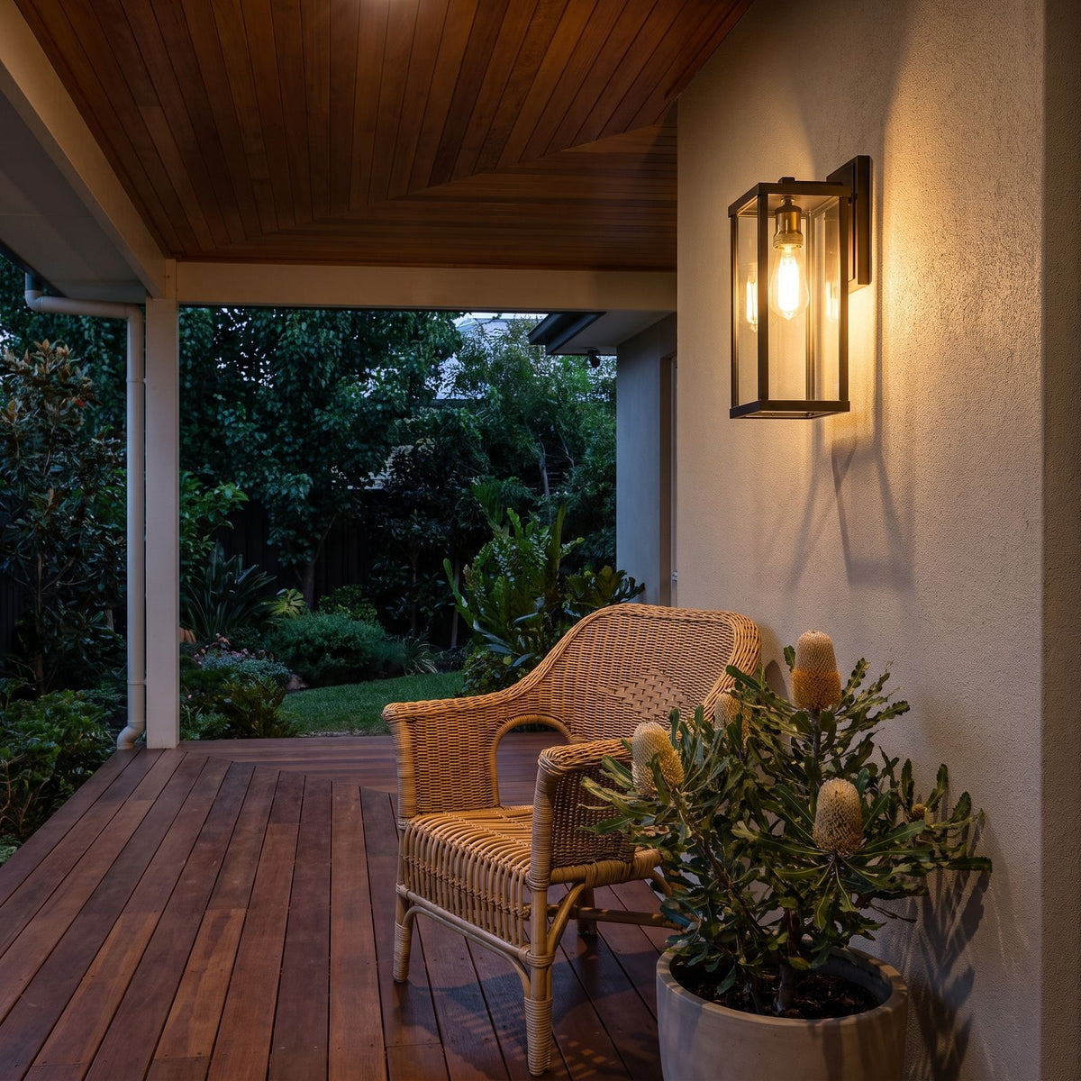 Clear Glass Lantern Outdoor Wall Light on a covered verandah