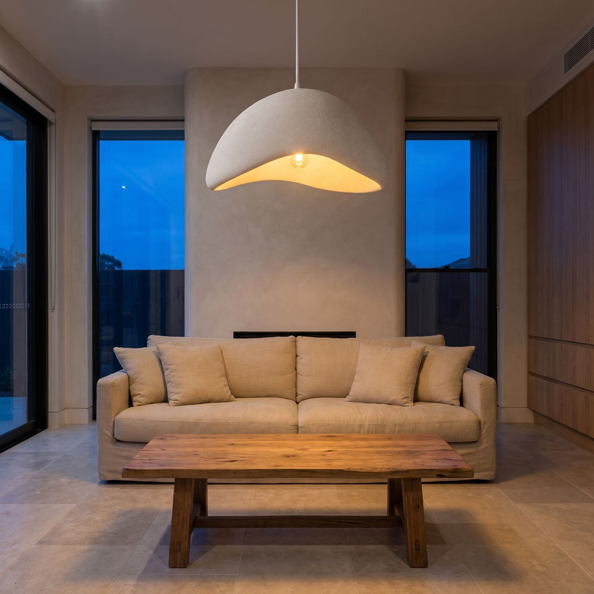 Cloud Shaped Japandi Pendant Light above a linen sofa in a living room