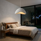 Cloud Shaped Japandi Pendant Light centred above a bed
