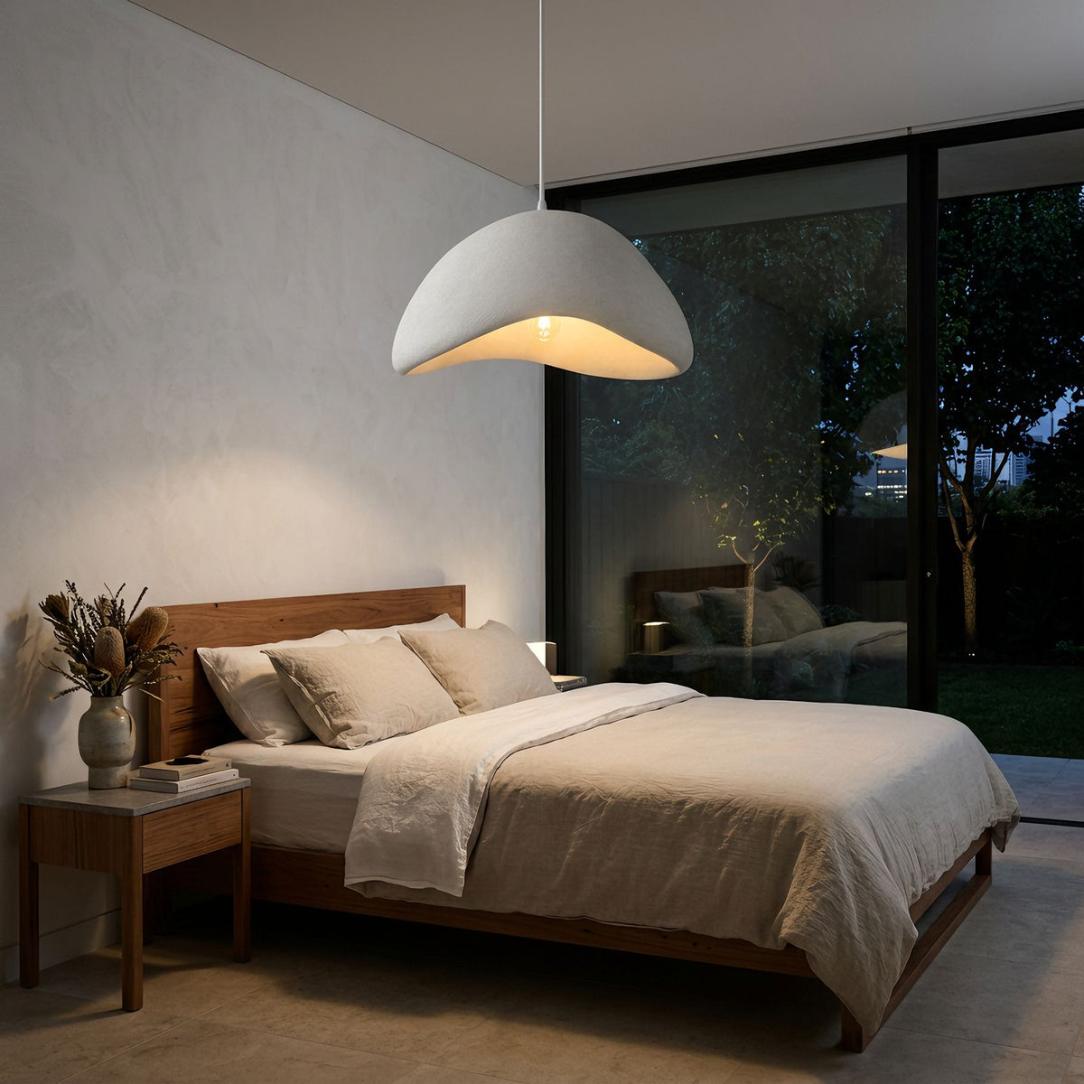 Cloud Shaped Japandi Pendant Light centred above a bed