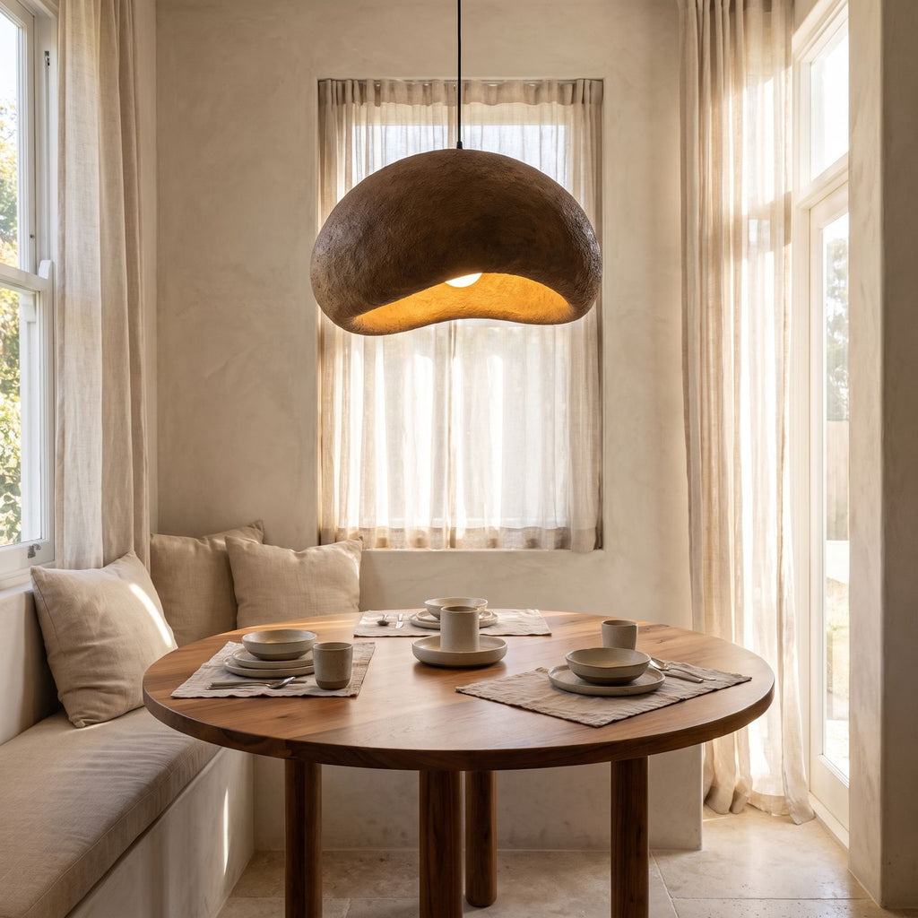 Coffee Brown Textured Resin Cloud Pendant Light above a round table in a breakfast nook