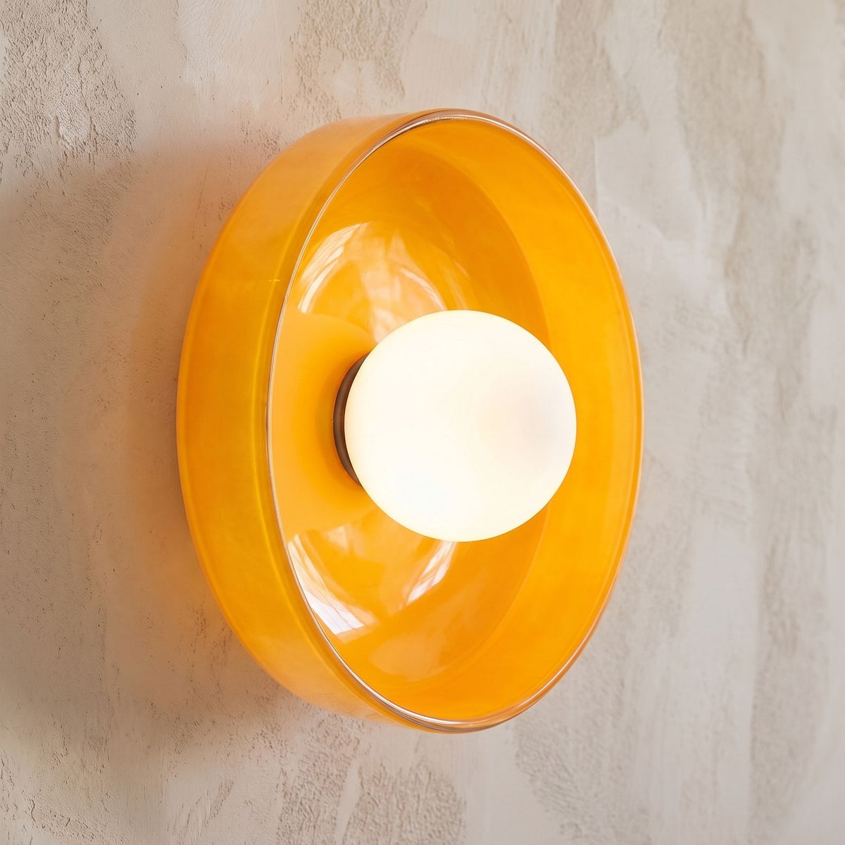 Close-up of the glass dish and opal globe