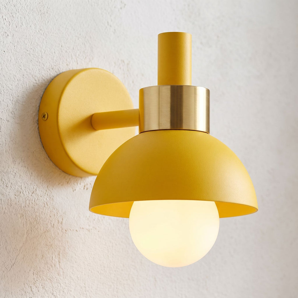 Coloured Matte Iron Cylinder Wall Light, close view at 45 degrees on a plaster wall