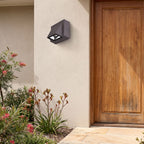 Compact Metal LED Outdoor Wall Light beside a timber front door