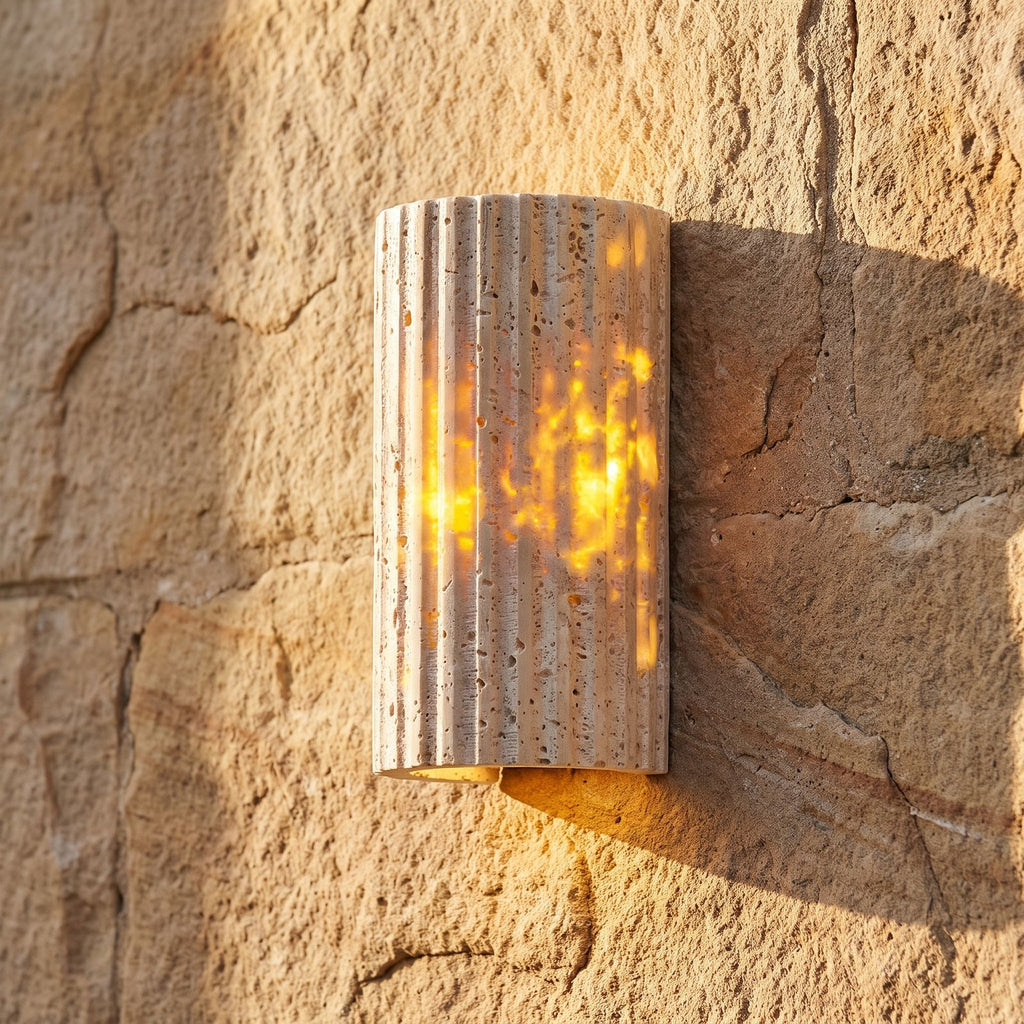 Compact Yellow Travertine Up Down Outdoor Wall Light, close view at 45 degrees on a stone wall